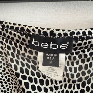 Vintage Bebe 2pc tank top w/lared bottom skirt in animal print -M